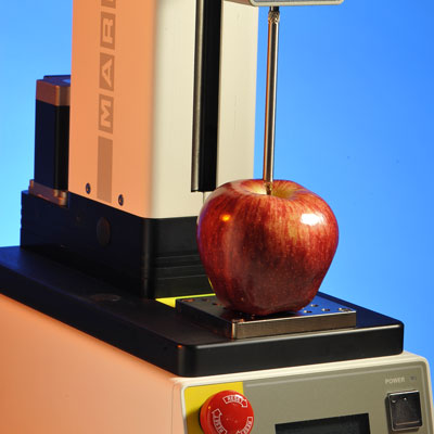 Photograph of a package compression or burst testing equipment