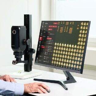 Technician using a Leica Microscope with Australian Distribution