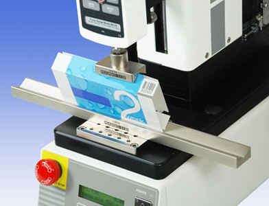 Photograph of an open force application tester for the pharmaceutical industry